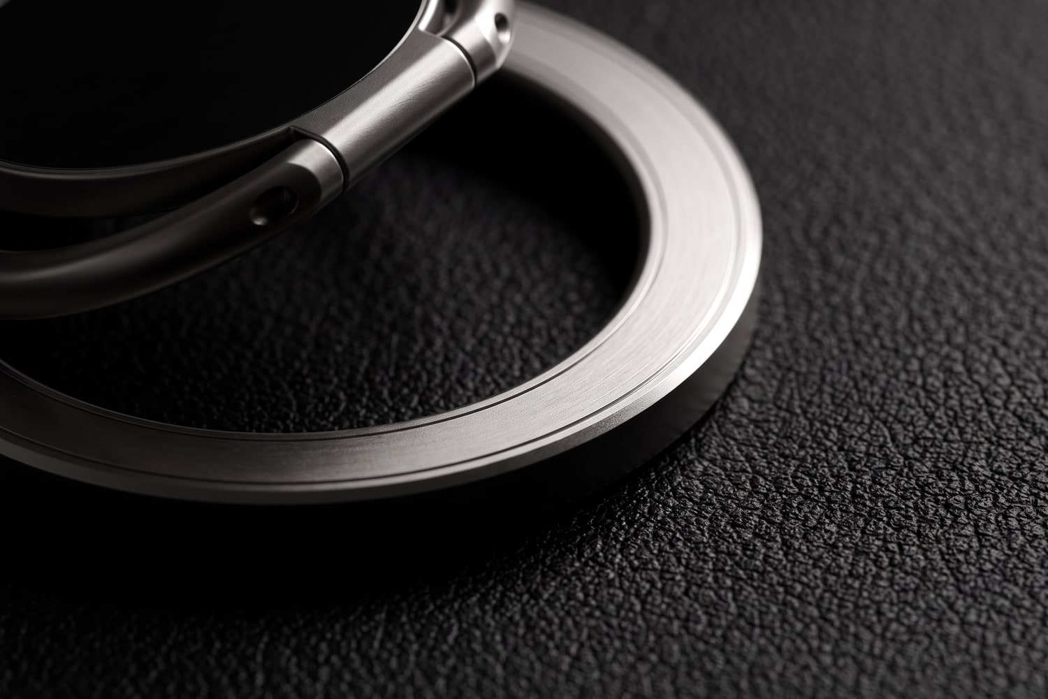 Macro of the machined ring and its finish on a dark surface.